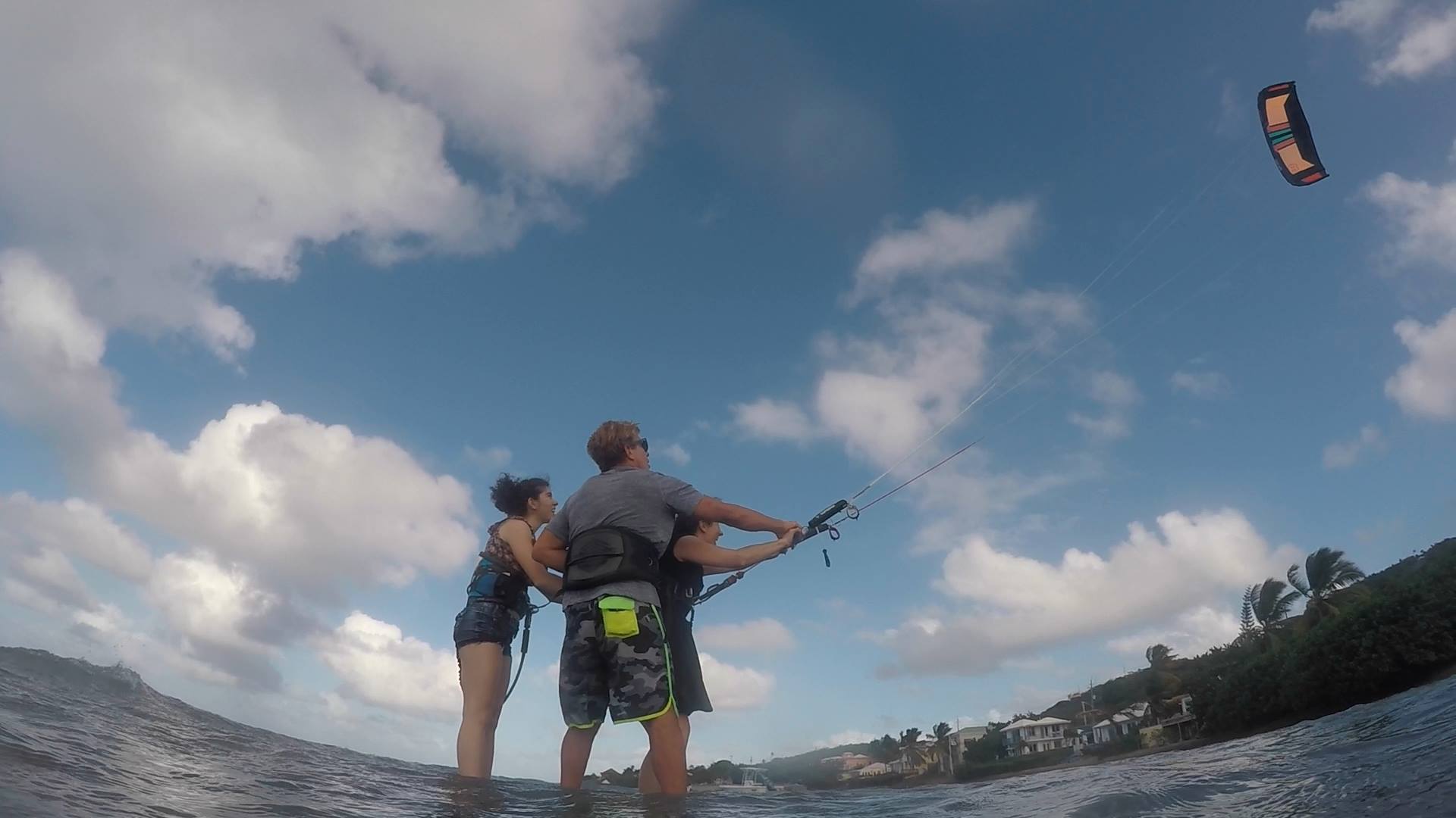Kite St. Croix teaching two women how to kiteboard.